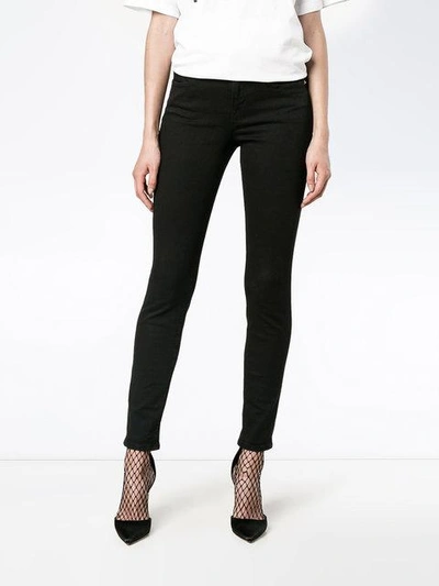 Shop Frame Le Color Black Mid Rise Skinny Jeans