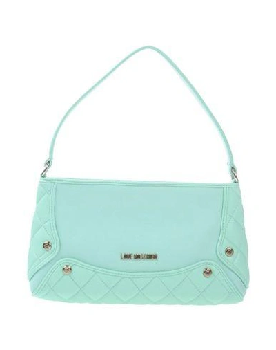 Shop Love Moschino Handbag In Light Green