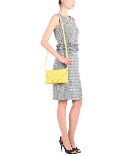 Shop Elena Ghisellini Handbag In Yellow