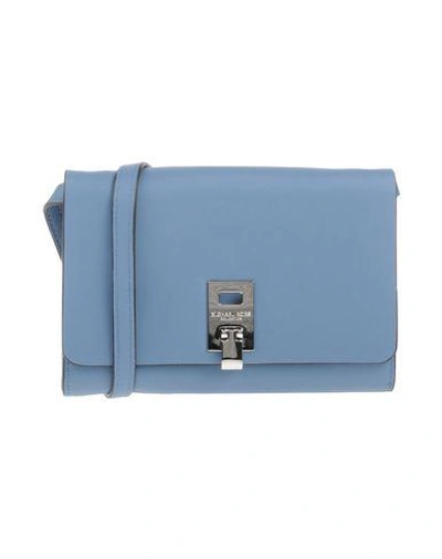 Shop Michael Kors Handbags In Sky Blue
