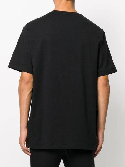Shop Versace Graphic Medusa Print T-shirt - Black
