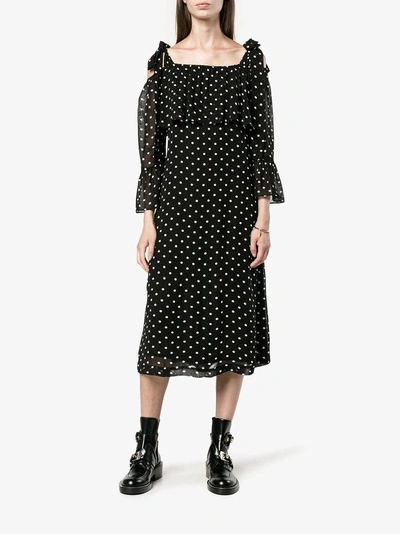 Shop Ganni Monette Polka Dot Off-shoulder Dress In Black