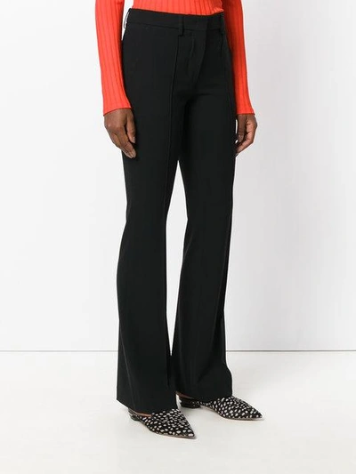 Shop Etro Flared Trousers - Black