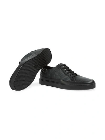 Shop Gucci Low-top-sneaker Aus Gg Supreme - Schwarz In Black