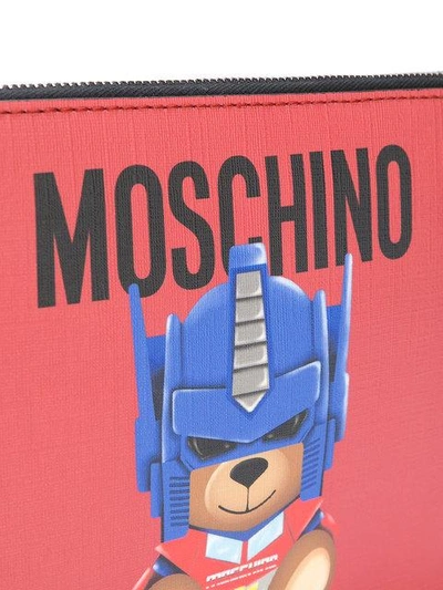 Shop Moschino Transformer Teddy Clutch Bag - Red