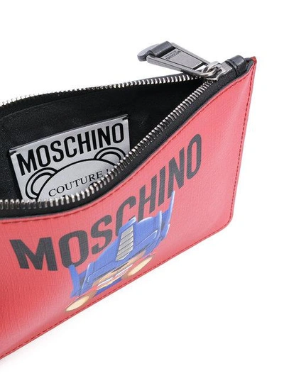 Shop Moschino Transformer Teddy Clutch Bag - Red