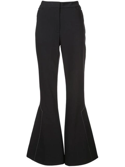 Shop Ellery Flared Trousers In Black