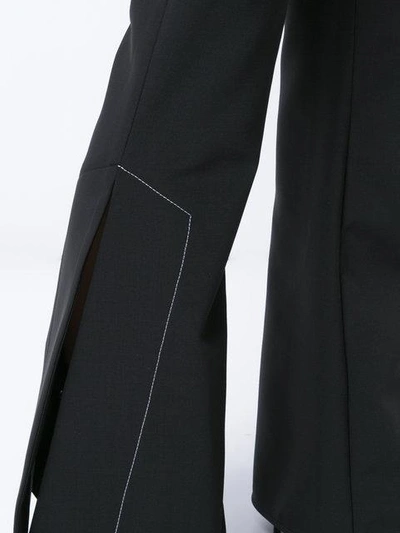 Shop Ellery Flared Trousers In Black