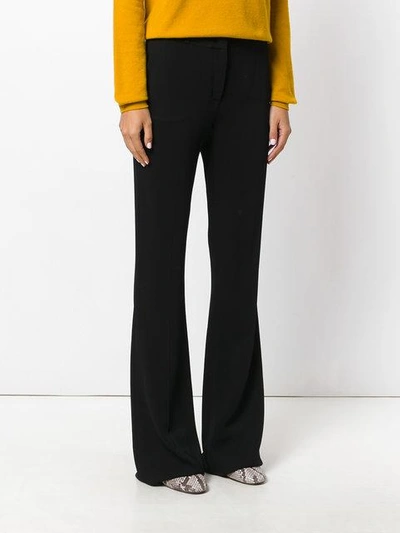 Shop Capucci Bootcut Flared Style Trousers In Black