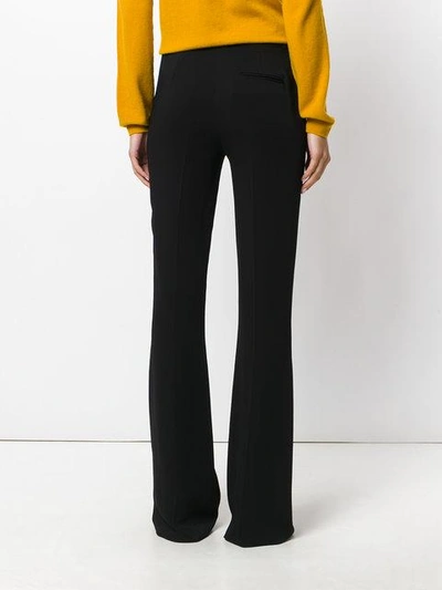 Shop Capucci Bootcut Flared Style Trousers In Black