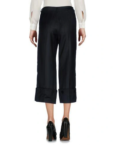 Shop Viktor & Rolf Cropped Pants & Culottes In Black