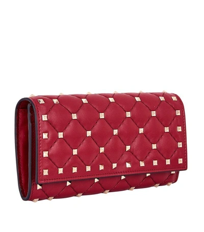 Shop Valentino Rockstud Spike Flap Wallet In Red
