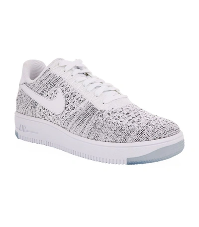 Shop Nike Air Force 1 Flyknit Low Sneakers In White