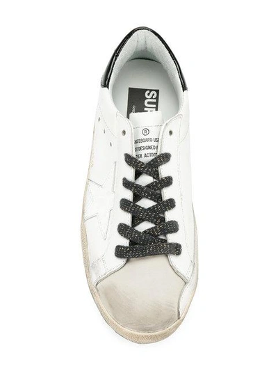 Shop Golden Goose Deluxe Brand Super Star Sneakers - White