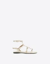 Valentino Rockstud Patent-leather Flat Sandals In Light Ivory