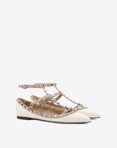 Shop Valentino Garavani Patent Rockstud Caged Ballet Flat In Ivory