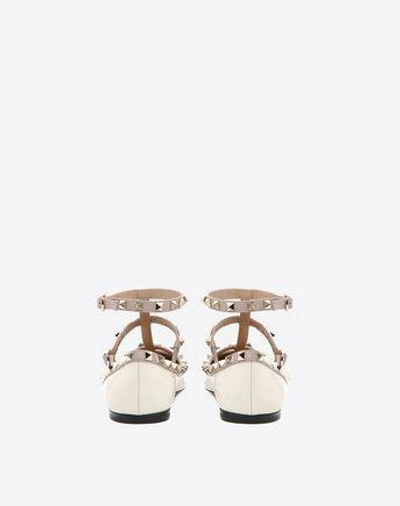 Shop Valentino Garavani Patent Rockstud Caged Ballet Flat In Ivory