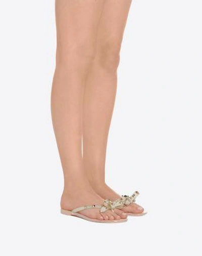 Shop Valentino Garavani Rockstud Glittered Rubber Flip Flop In Gold