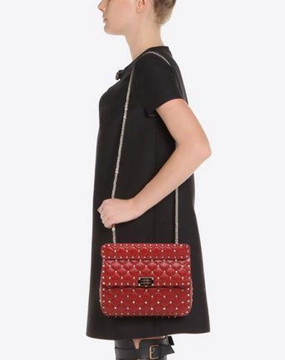 Shop Valentino Garavani Rockstud Spike Medium Chain Bag In  Red
