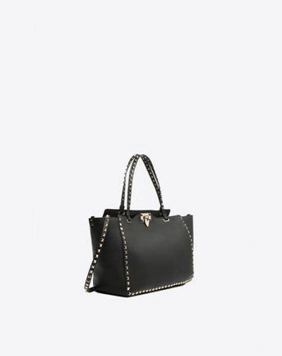 Shop Valentino Garavani Medium Grainy Calfskin Rockstud Bag In Black