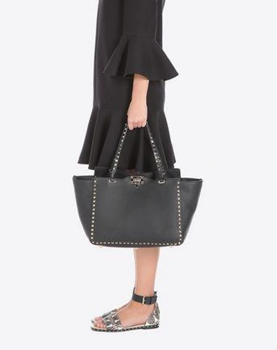 Shop Valentino Garavani Medium Grainy Calfskin Rockstud Bag In Black