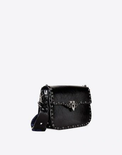 Shop Valentino Rockstud Bag In Black