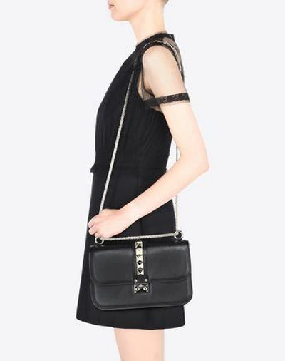 Shop Valentino Chain Cross Body Bag In Black