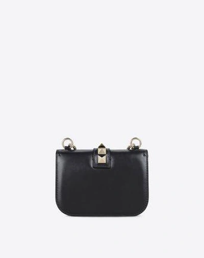 Shop Valentino Small Chain Cross Body Bag In Black