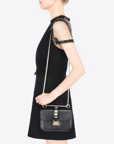 Shop Valentino Small Chain Cross Body Bag In Black