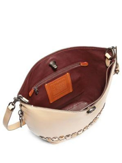 Shop Coach Eyelet Leather Shoulder Bag In Tan