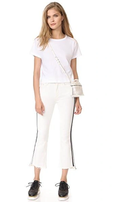 Shop Mother Insider Crop Step Fray Jeans In Whipping The Racer