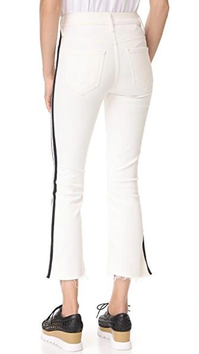 Shop Mother Insider Crop Step Fray Jeans In Whipping The Racer