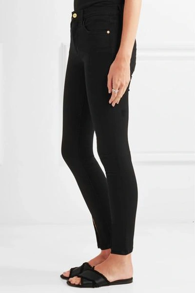 Shop Frame Le High Skinny Jeans In Black