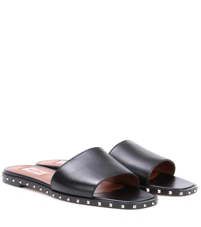 Shop Valentino Garavani Rockstud Leather Slides In Eero