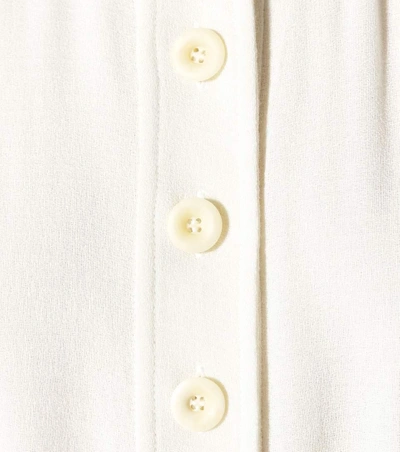 Shop Chloé Long-sleeved Crêpe Jumpsuit In White