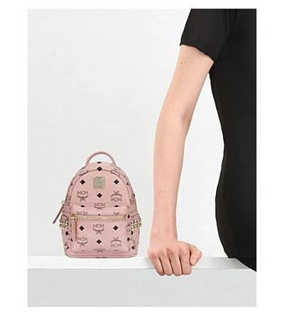 Shop Mcm Mini Stark Coated Canvas Backpack In Soft Pink