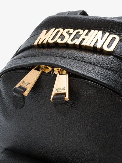 Shop Moschino Mini Rucksack Mit Logo-schild In Black