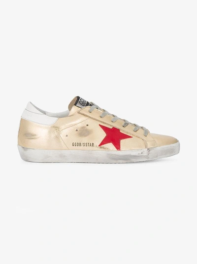 Shop Golden Goose Deluxe Brand Gold Superstar Leather Sneakers In Metallic