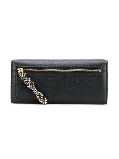 Shop Alexander Mcqueen Slim Flap Wallet - Black