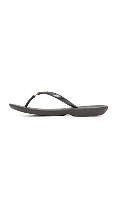 Shop Havaianas Ring Flip Flops In Black