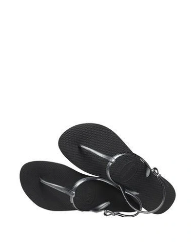 Shop Havaianas Flip Flops In Black