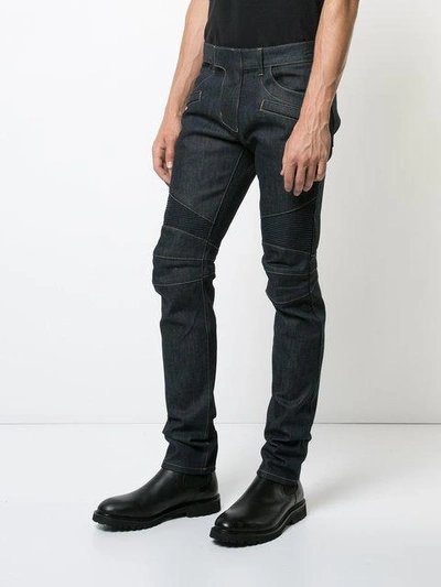 Shop Balmain Raw Denim Biker Jeans In Blue