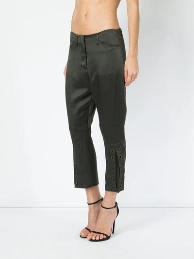 Shop Fendi Eyelet Cropped Trousers In Green