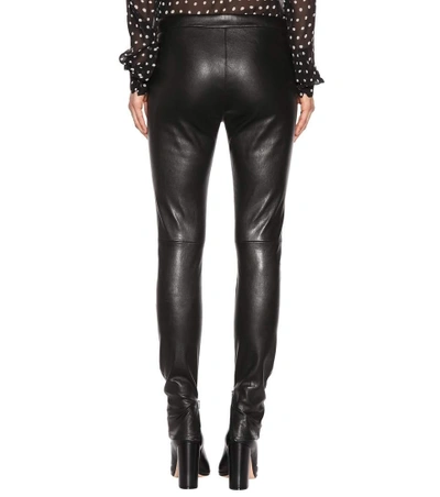 Shop Saint Laurent Leather Leggings In Black