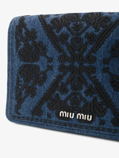 Shop Miu Miu Embroidered Denim Clutch Bag In Black