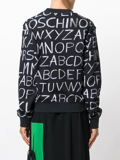 Shop Love Moschino Alphabet Sweater