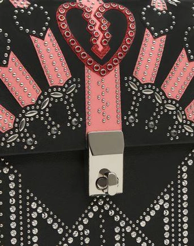 Shop Valentino Metal Loveblade Cross Body Bag In Black