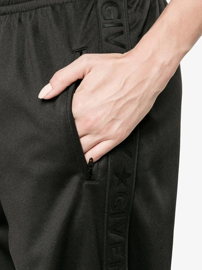 Shop Givenchy Black Logo Stripe Track Pants
