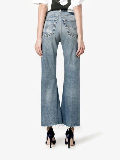 Shop Re/done Levi's Distressed High Waisted Cropped Jeans In Blue