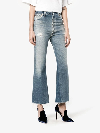 Shop Re/done Levi's Distressed High Waisted Cropped Jeans In Blue